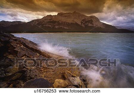Mountains and a body of water View Large Photo Image Stock Image - Mountains and a body of water. Fotosearch