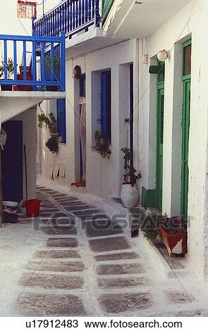 Picturesque whitewashed houses, Mykonos, Greece View Large Photo Image Stock Image - Picturesque whitewashed houses, Mykonos, Greece. Fotosearch