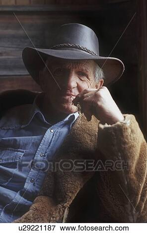 Stock Photo - Portrait of a cowboy. Fotosearch