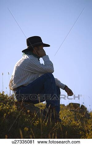 Stock Image - Profile of a cowboy. Fotosearch