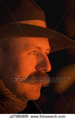 Profile of a cowboy's face View Large Photo Image Stock Photo - Profile of a cowboy's face. Fotosearch