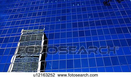 Stock Image - Reflection of a high-rise. Fotosearch