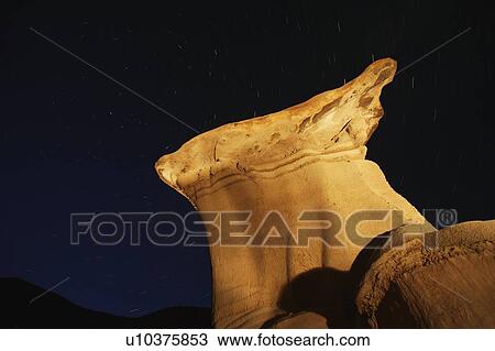 Rock formation against a night sky View Large Photo Image Stock Image - Rock formation against a night sky. Fotosearch