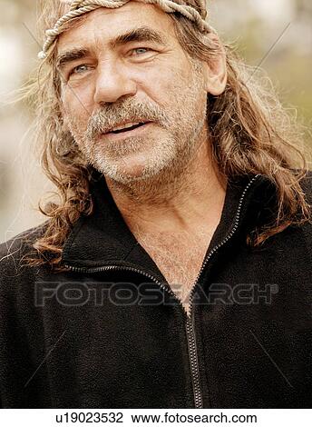 Senior Man With Long Hair And Headband Stock Image U19023532