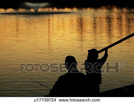 Silhouette of adult and child fishing View Large Photo Image Picture - Silhouette of adult and child fishing. Fotosearch