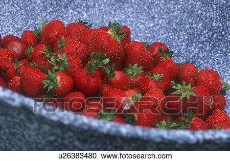 Stock Image - Strawberries in a bowl. Fotosearch