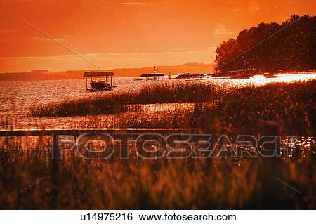 Stock Photograph - Sunlight on Shoreline. Fotosearch