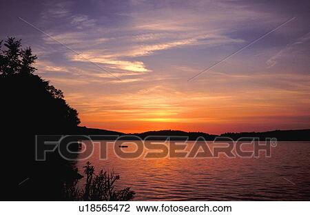 Sunset at a lake View Large Photo Image Stock Image - Sunset at a lake. Fotosearch