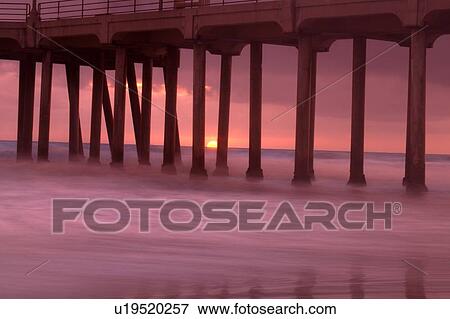 Sunset behind pier View Large Photo Image Stock Photo - Sunset behind pier. Fotosearch
