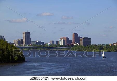 View of city across the river View Large Photo Image Stock Image - View of city across the river. Fotosearch
