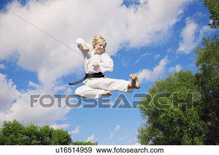Woman doing martial arts View Large Photo Image Stock Photo - Woman doing martial arts. Fotosearch