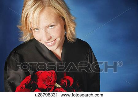 Stock Image - Woman with formal gown and roses. Fotosearch