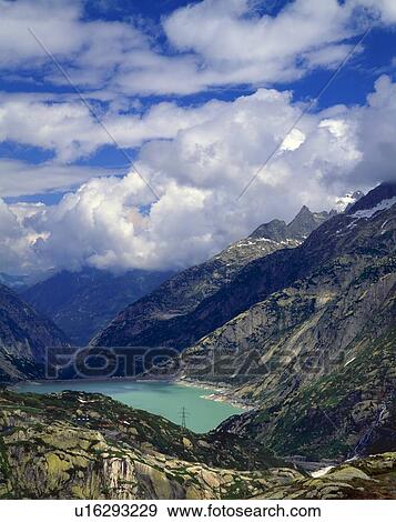 A hydro electric reservoir in the Swiss Alps View Large Photo Image Stock Photo - A hydro electric reservoir in the Swiss Alps. Fotosearch