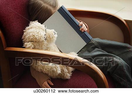 Child falls asleep with book View Large Photo Image Stock Image - Child falls asleep with book. Fotosearch