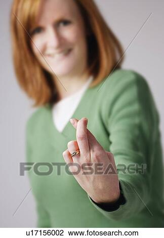 Crossed fingers View Large Photo Image Stock Image - Crossed fingers. Fotosearch