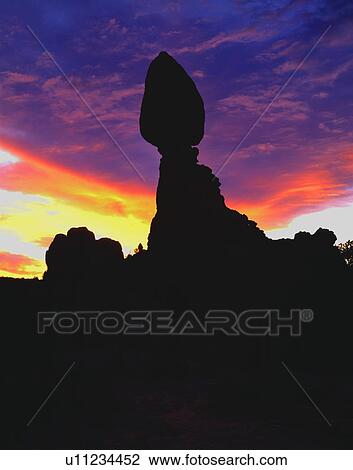 Dawn sky silhouette, Balanced Rock, Arches National Park View Large Photo Image Stock Image - Dawn sky silhouette, Balanced Rock, Arches National Park. Fotosearch