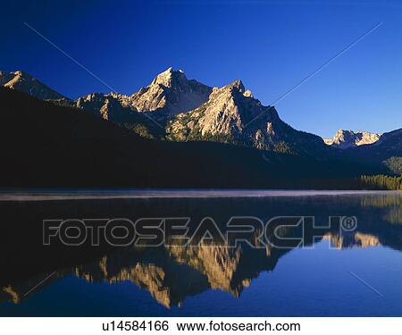 Stock Photograph - Early morning in the Sawtooth Range. Fotosearch