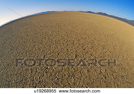 Stock Photography - Fisheye view of Alvord Desert. Fotosearch