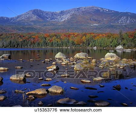 Stock Photograph - Hamlin Peak, Sandy Stream Pond, flanks of Mount Katahdin, autumn color, Baxter State Park. Fotosearch
