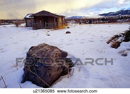 Stock Photography - Historic Oregon Trail Cabin in winter. Fotosearch