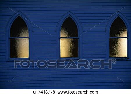 Illuminated church windows View Large Photo Image Stock Photo - Illuminated church windows. Fotosearch