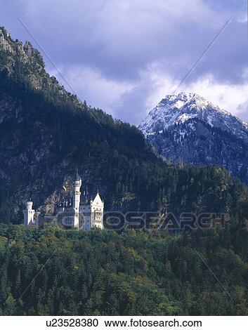 Stock Image - Neuschwannstein, fairytale castle built by Mad King Ludwig of Bavaria. Fotosearch