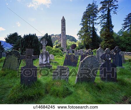 Old gravestones and tower of St. Kevin's Church, historic Glendalough Monastery View Large Photo Image Stock Photography - Old gravestones and tower of St. Kevin's Church, historic Glendalough Monastery. Fotosearch