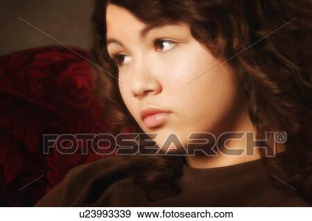 Stock Photo - Portrait of a woman looking away. Fotosearch
