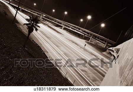 Stock Photo - Quiet highway at night. Fotosearch