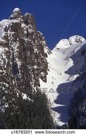 Stock Image - Rugged mountain peak. Fotosearch