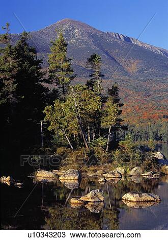 Shoreline trees and Mount Katahdin, Sandy Stream Pond, autumn, Baxter State Park. View Large Photo Image Stock Image - Shoreline trees and Mount Katahdin, Sandy Stream Pond, autumn, Baxter State Park.. Fotosearch