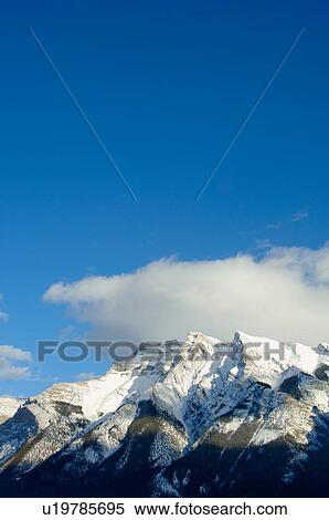 Snowy mountain peaks View Large Photo Image Stock Photography - Snowy mountain peaks. Fotosearch
