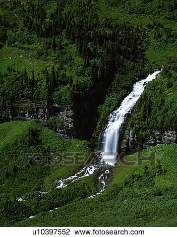 Spring waterfall on Reynolds Creek, Logan Pass, Glacier National Park View Large Photo Image Stock Image - Spring waterfall on Reynolds Creek, Logan Pass, Glacier National Park. Fotosearch