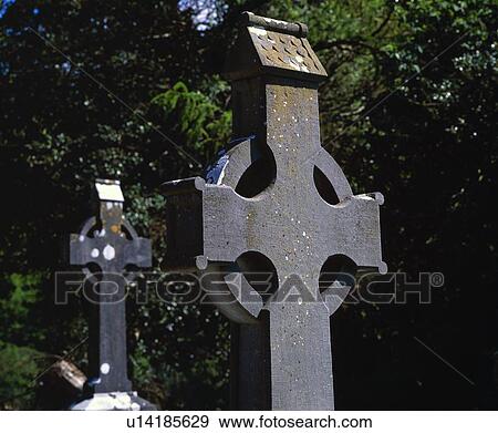 Stone crosses at Glendalough Monastery historic site View Large Photo Image Stock Photo - Stone crosses at Glendalough Monastery historic site. Fotosearch