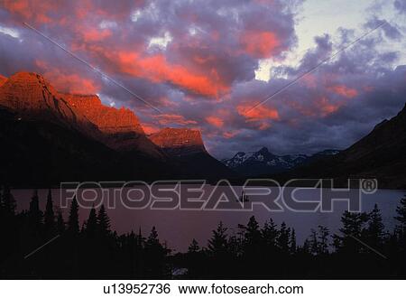 Summer sunrise, Saint Mary Lake, Glacier National Park View Large Photo Image Stock Photograph - Summer sunrise, Saint Mary Lake, Glacier National Park. Fotosearch