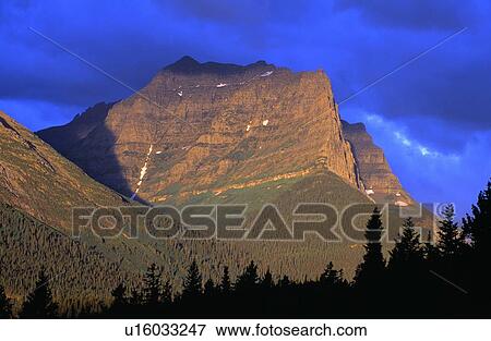 Sunrise on Dusty Star Mountain, Glacier National Park View Large Photo Image Stock Photo - Sunrise on Dusty Star Mountain, Glacier National Park. Fotosearch