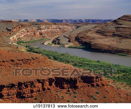 The San Juan River winds through a barren landscape View Large Photo Image Stock Image - The San Juan River winds through a barren landscape. Fotosearch