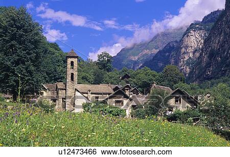 Stock Photograph - Town in lush valley. Fotosearch