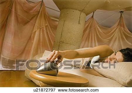 Stock Photo - Waking Up, Alarm Clock. Fotosearch