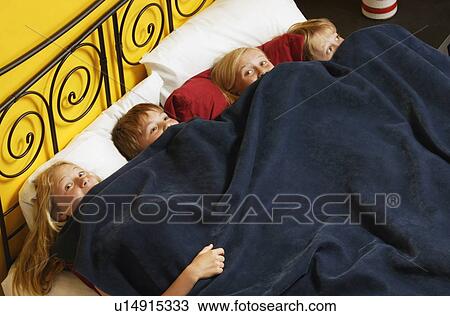 A group of girls having a sleepover View Large Photo Image Stock Image - A group of girls having a sleepover. Fotosearch