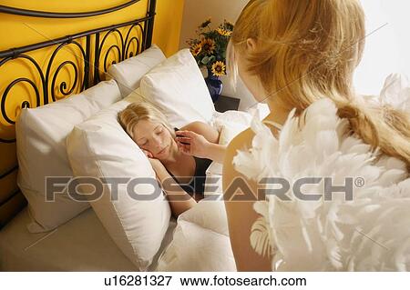Stock Photo - A guardian angel. Fotosearch