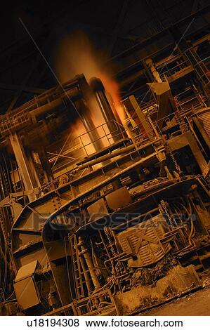 Stock Photo - A molten steel factory. Fotosearch