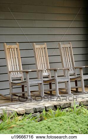 Stock Photograph - A row of cottage chairs. Fotosearch
