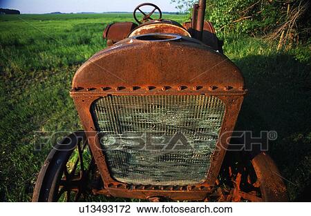 A rusty old tractor View Large Photo Image Stock Image - A rusty old tractor. Fotosearch