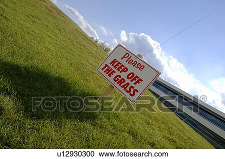 Stock Image - A sign in the grass. Fotosearch