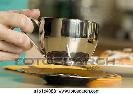 Stock Image - A stainless steel mug. Fotosearch