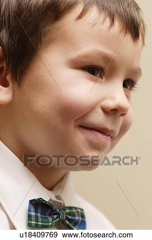 A young boy View Large Photo Image Stock Photo - A young boy. Fotosearch