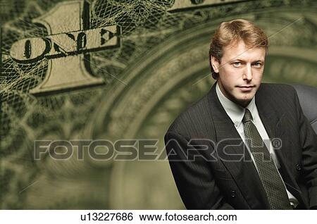 Stock Photograph - American dollar bill and businessman. Fotosearch
