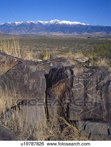 Stock Photograph - Ancient drawings on rock. Fotosearch