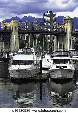 Boats in a harbor View Large Photo Image Stock Photograph - Boats in a harbor. Fotosearch